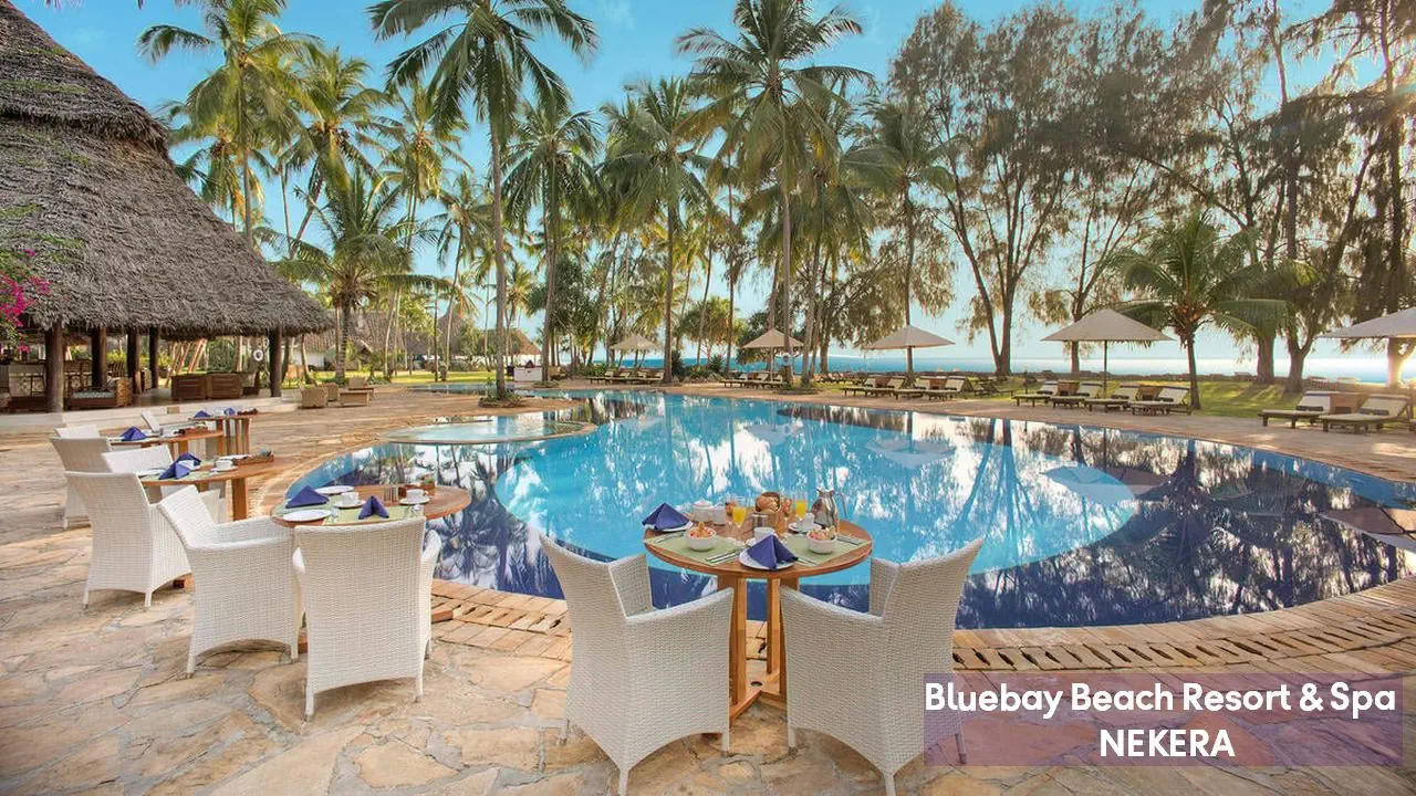 Pool and grounds of Bluebay Beach Resort & Spa