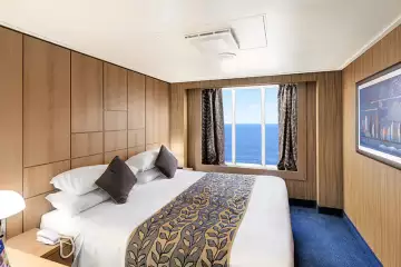 Example MSC Sinfonia ocean-view cabin from the exact offer gallery; the selected OO category has a partially obstructed view